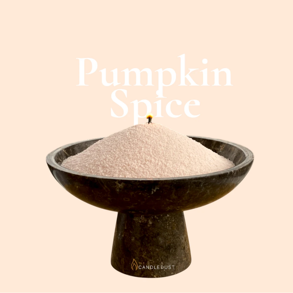 Pumpkin spice candle sand poured in a decorative bowl-shaped holder